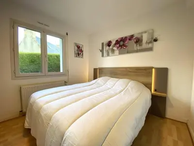 Un ou plusieurs lits dans un hébergement de l'établissement Maison VUE MER, jardin, terrasse, WIFI, au SUD, à TREBEURDEN - Réf 663