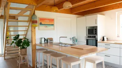 Cuisine ou kitchenette dans l'établissement La maison des dunes - Proche plage Sainte Marguerite