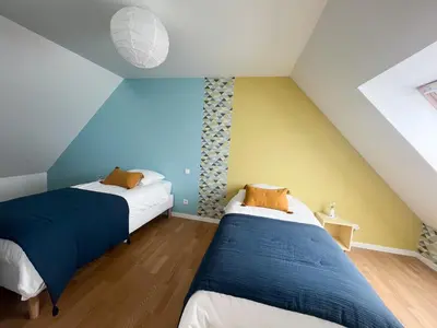 Un ou plusieurs lits dans un hébergement de l'établissement La maison des dunes - Proche plage Sainte Marguerite