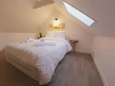 Un ou plusieurs lits dans un hébergement de l'établissement Duplex Cosy 2