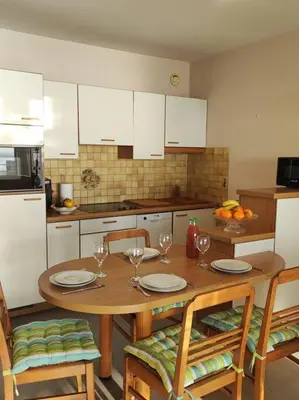 Cuisine ou kitchenette dans l'établissement L'Escale - Appartement vue mer