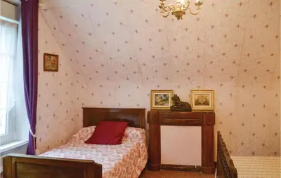 Un ou plusieurs lits dans un hébergement de l'établissement Holiday Home Saint Jean-Trolimon - 02