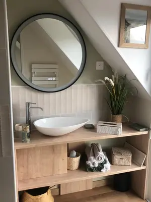 Salle de bains dans l'établissement LA CORENTINE