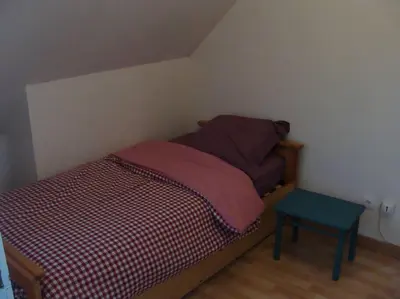 Un ou plusieurs lits dans un hébergement de l'établissement MAISON SUR TERRAIN CLOS MER IROISE