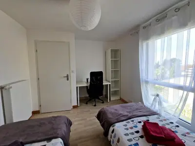 Un ou plusieurs lits dans un hébergement de l'établissement Modern house near the coast