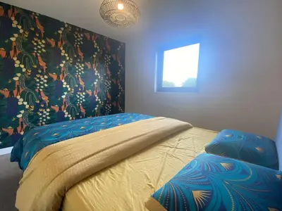 Un ou plusieurs lits dans un hébergement de l'établissement Fouesnant, superbe maison en bois, proche de la plage de Mousterlin