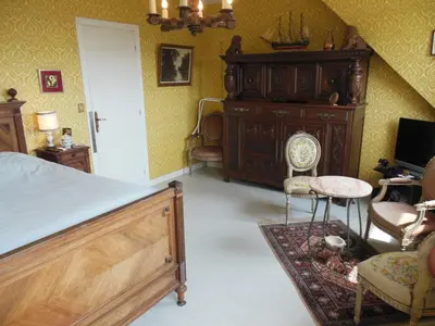 Télévision ou salle de divertissement dans l'établissement Maison avec vue sur Morgat