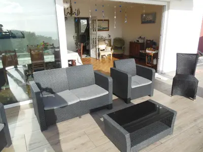Coin salon dans l'établissement Maison avec vue sur Morgat