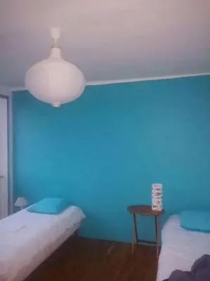 Un ou plusieurs lits dans un hébergement de l'établissement Grande maison dans un village côtier du Finistère