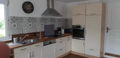 Cuisine ou kitchenette dans l'établissement Gîte de Bealieu