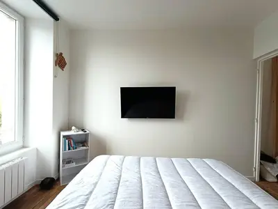 Télévision ou salle de divertissement dans l'établissement Appartement au centre de TREBEURDEN et à 400m de la plage - Réf 662