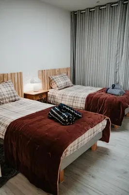 Un ou plusieurs lits dans un hébergement de l'établissement La Villa Des Dunes 4 étoiles , 100 m de la mer, spa, sauna