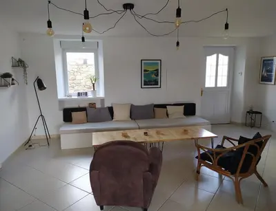 Coin salon dans l'établissement L'ilot des abers Maison de vacances