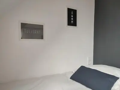 Un ou plusieurs lits dans un hébergement de l'établissement L'ilot des abers Maison de vacances