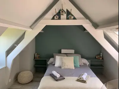 Un ou plusieurs lits dans un hébergement de l'établissement Les Tortues, maison bord de mer, plage à 200 m