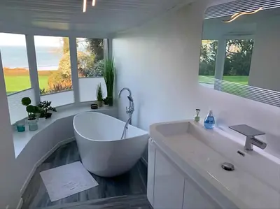 Salle de bains dans l'établissement Les Tortues, maison bord de mer, plage à 200 m