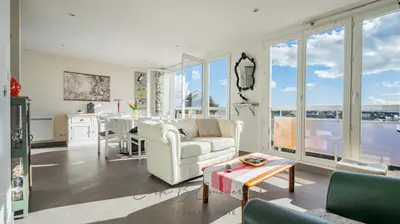 Coin salon dans l'établissement EVASION MARINE appartement VUE MER 2-4 personnes