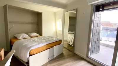 Un ou plusieurs lits dans un hébergement de l'établissement Studio avec terrasse vue Mer et Parking