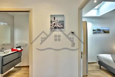 Un ou plusieurs lits dans un hébergement de l'établissement LocaLise - M1 - Bain de mer - Maison entièrement rénové avec jardin clos - Wifi inclus - Draps inclus - Animaux bienvenus