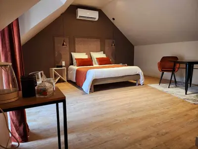Un ou plusieurs lits dans un hébergement de l'établissement Ti Ar Kalon, maison proche de Quimper