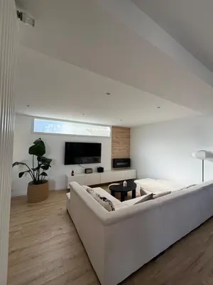 Télévision ou salle de divertissement dans l'établissement La maison de Julia - Piscine privée