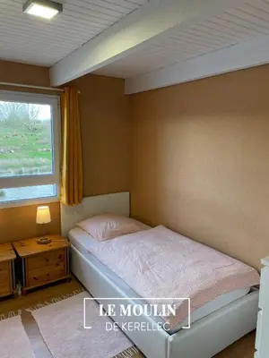 Un ou plusieurs lits dans un hébergement de l'établissement Cottage Ouessant in Kerellec (watermill 5km Roscoff)