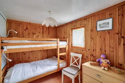 Un ou plusieurs lits dans un hébergement de l'établissement À 800m de la plage, chalet cosy pour 4
