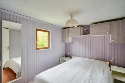 Un ou plusieurs lits dans un hébergement de l'établissement À 800m de la plage, chalet cosy pour 4