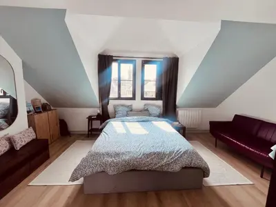 Un ou plusieurs lits dans un hébergement de l'établissement Sweet Leon - grande chambre baignoire vue mer