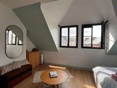 Un ou plusieurs lits dans un hébergement de l'établissement Sweet Leon - grande chambre baignoire vue mer