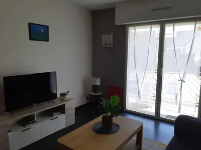 Télévision ou salle de divertissement dans l'établissement Appartement au centre-ville Concarneau