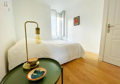 Un ou plusieurs lits dans un hébergement de l'établissement Charmant appartement rénové au cœur de Concarneau