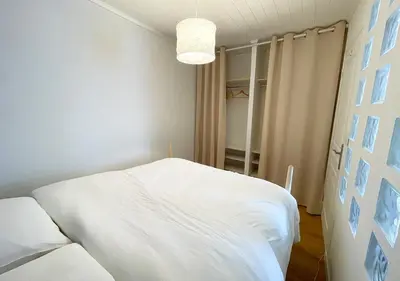 Un ou plusieurs lits dans un hébergement de l'établissement Charmant appartement rénové au cœur de Concarneau