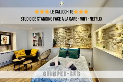 Coin salon dans l'établissement LE CALLOCH 1G - Wifi - Parking Facile - Gare