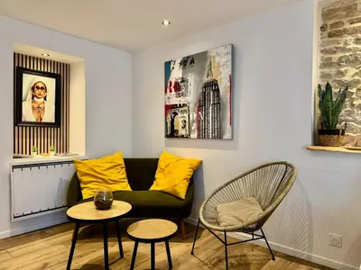 Coin salon dans l'établissement LE CALLOCH 1G - Wifi - Parking Facile - Gare