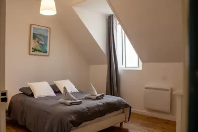 Un ou plusieurs lits dans un hébergement de l'établissement Ti Ar Bourg