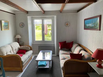 Coin salon dans l'établissement Maison bretonne traditionnelle en bord de Mer