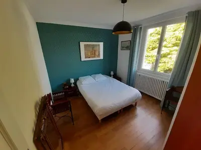 Un ou plusieurs lits dans un hébergement de l'établissement Champêtre - Maison au Passage Concarneau
