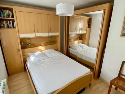 Un ou plusieurs lits dans un hébergement de l'établissement La petite Garzette - Appartement Jardin Centre Ville Concarneau