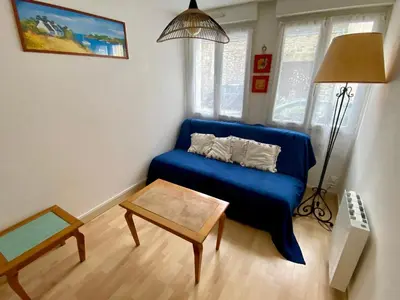 Coin salon dans l'établissement La petite Garzette - Appartement Jardin Centre Ville Concarneau