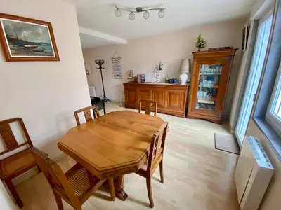 Cuisine ou kitchenette dans l'établissement La petite Garzette - Appartement Jardin Centre Ville Concarneau