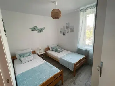 Un ou plusieurs lits dans un hébergement de l'établissement Le Grand Large - Appartement Centre Concarneau