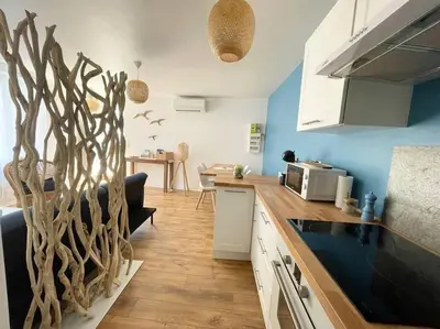 Cuisine ou kitchenette dans l'établissement Le Grand Large - Appartement Centre Concarneau