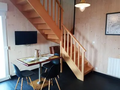 Télévision ou salle de divertissement dans l'établissement Chez Fanch