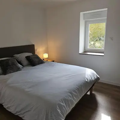 Un ou plusieurs lits dans un hébergement de l'établissement Maison néo bretonne rénovée à 2mn à pied d'une jolie plage