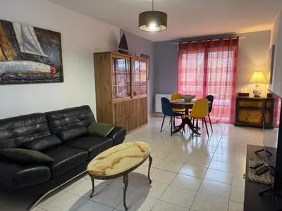 Coin salon dans l'établissement Appartement Etape en presqu'île