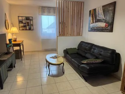 Coin salon dans l'établissement Appartement Etape en presqu'île