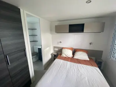 Un ou plusieurs lits dans un hébergement de l'établissement mobil home 394 - Domaine de Kerlann