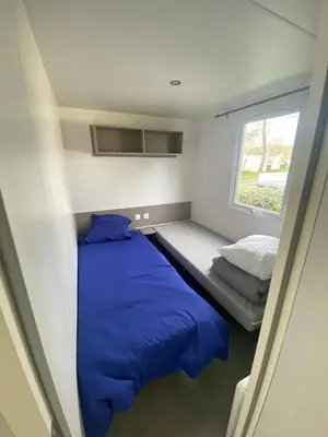 Un ou plusieurs lits dans un hébergement de l'établissement mobil home 394 - Domaine de Kerlann