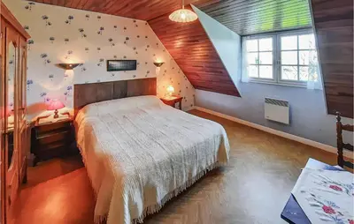 Un ou plusieurs lits dans un hébergement de l'établissement Nice Home In Pleuven With Wifi